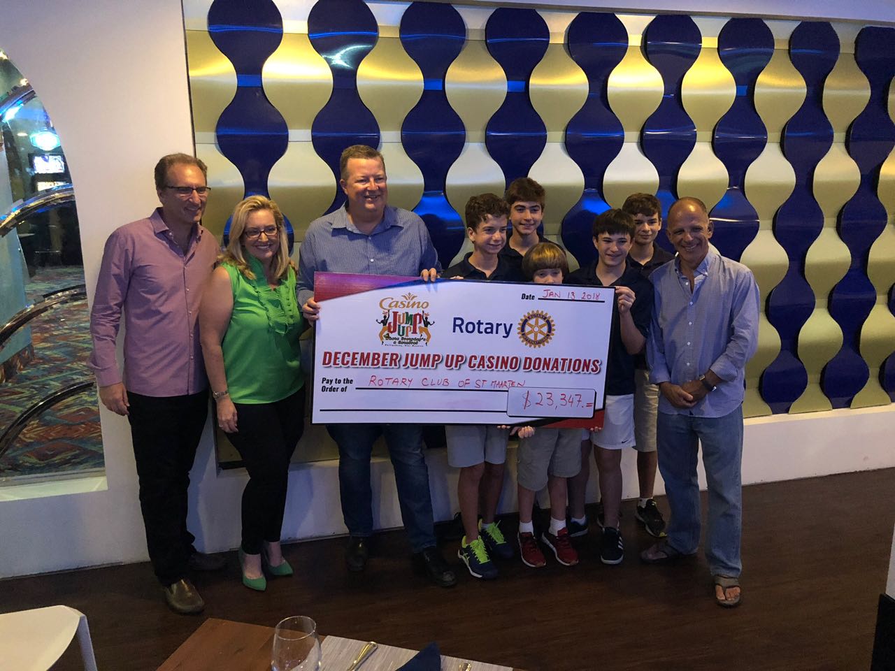 Rotary Club accepting donation Jump Up Casino