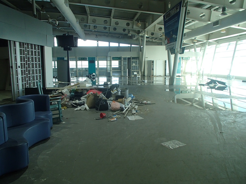Inside main airport terminal building departure lounge